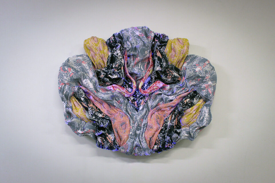 The artwork Andetag no. 1, textile sculpture in spotlight.