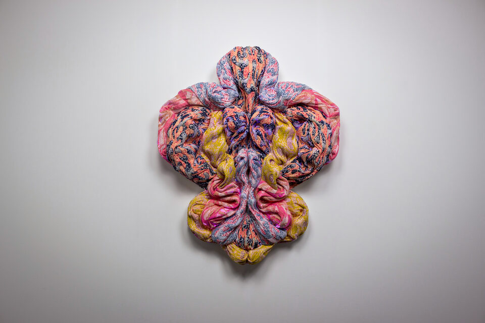 The artwork Andetag no. 10, textile sculpture in spotlight.