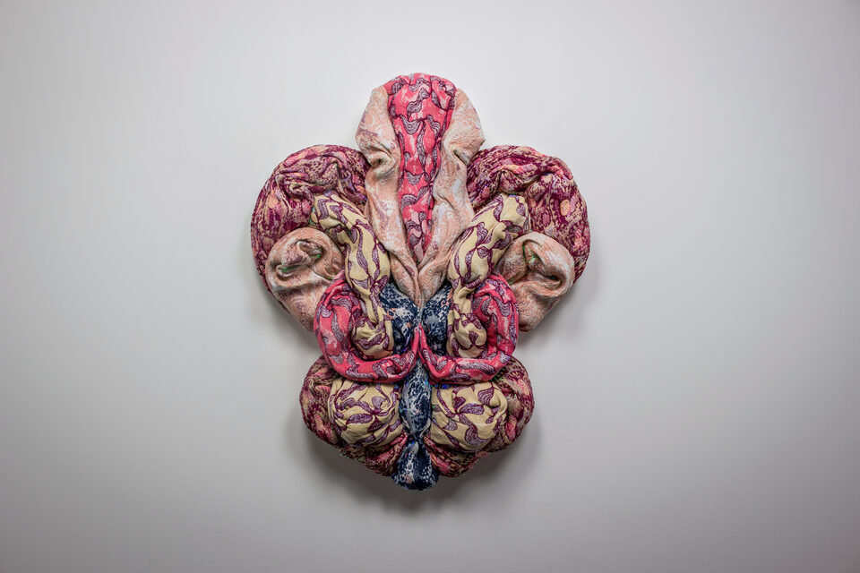 The artwork Andetag no. 12, textile sculpture in spotlight.