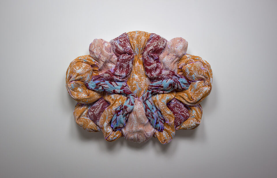 The artwork Andetag no. 14, textile sculpture in spotlight.