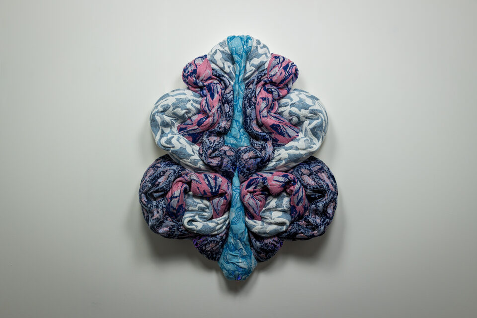 The artwork Andetag no. 17, textile sculpture in spotlight.