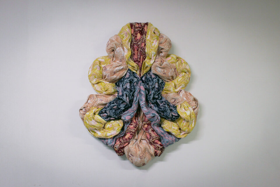 The artwork Andetag no. 2, textile sculpture in spotlight.