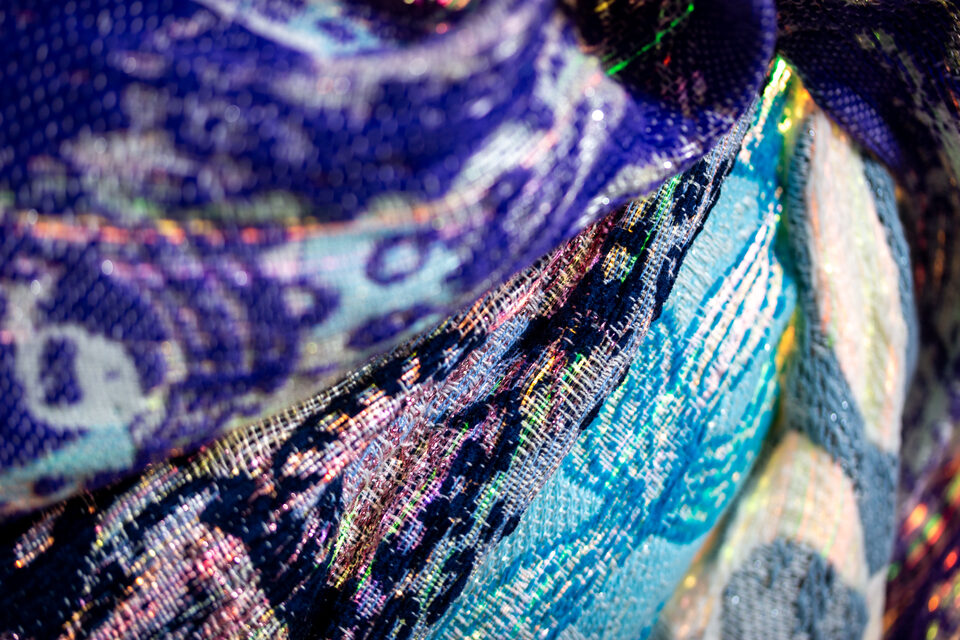 Close-up of the artwork Andetag no. 22, woven structure in optical fibre textile.