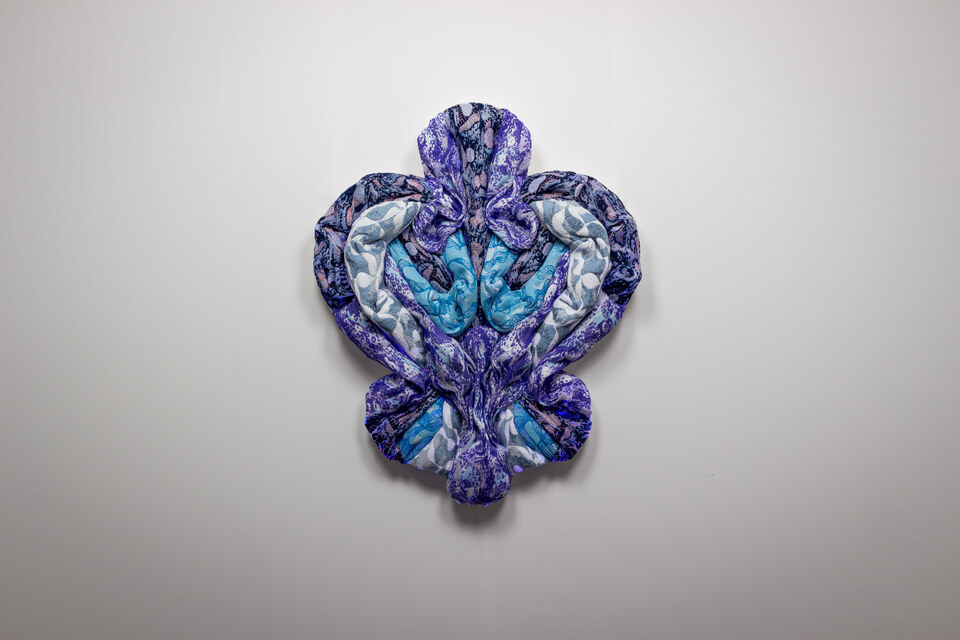 The artwork Andetag no. 22, textile sculpture in spotlight.