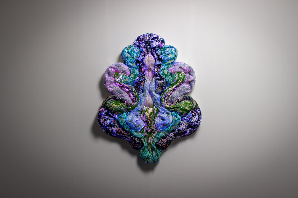 The artwork Andetag no. 23, textile sculpture in soft ambient light.