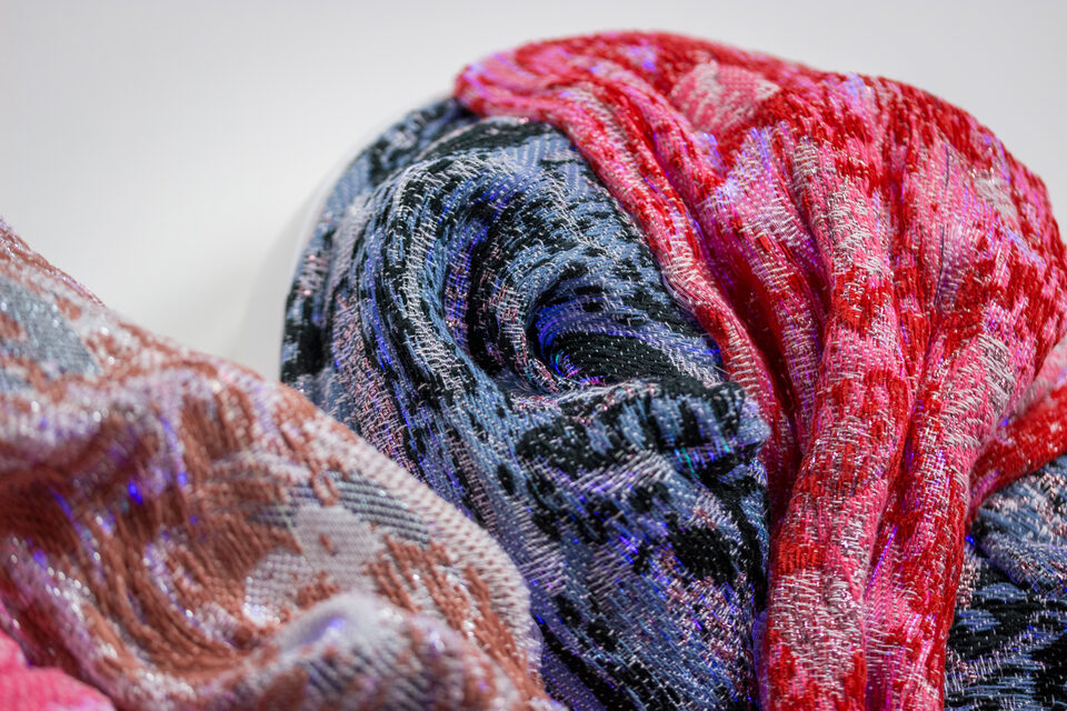 Close-up of the artwork Andetag no. 24, woven structure in optical fibre textile.