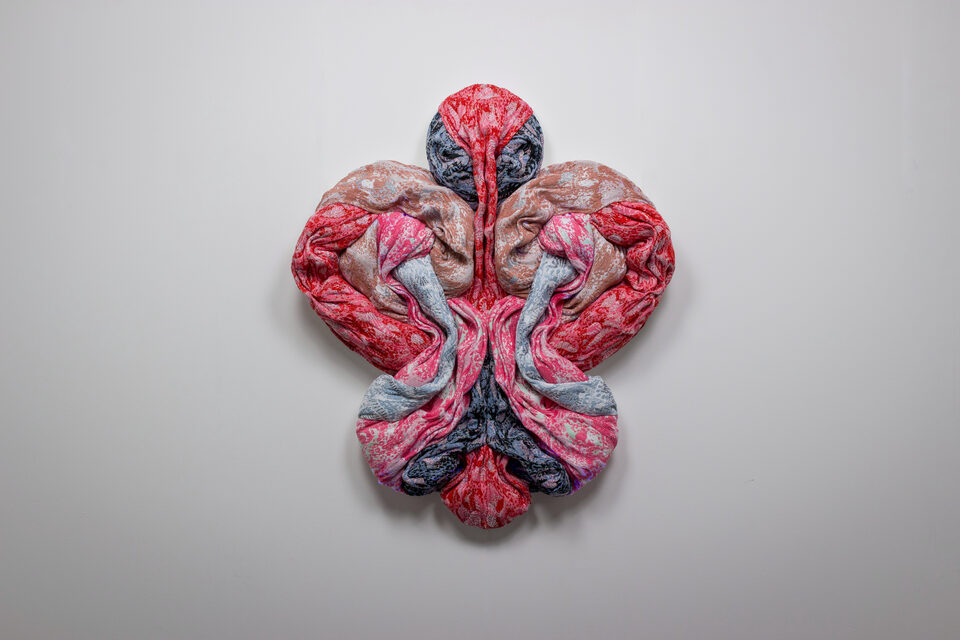 The artwork Andetag no. 24, textile sculpture in spotlight.