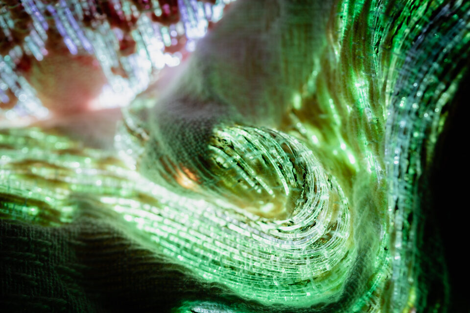 Close-up of the artwork Andetag no. 25, woven structure in optical fibre textile.