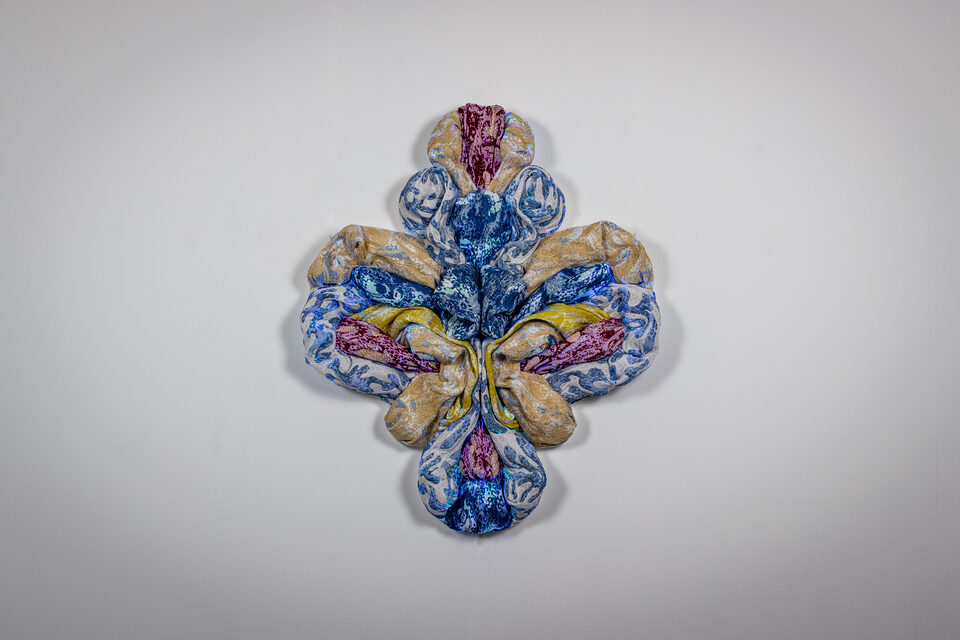 The artwork Andetag no. 28, textile sculpture in spotlight.
