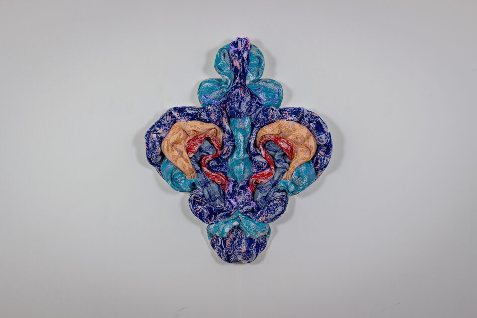 The artwork Andetag no. 33, textile sculpture in spotlight.