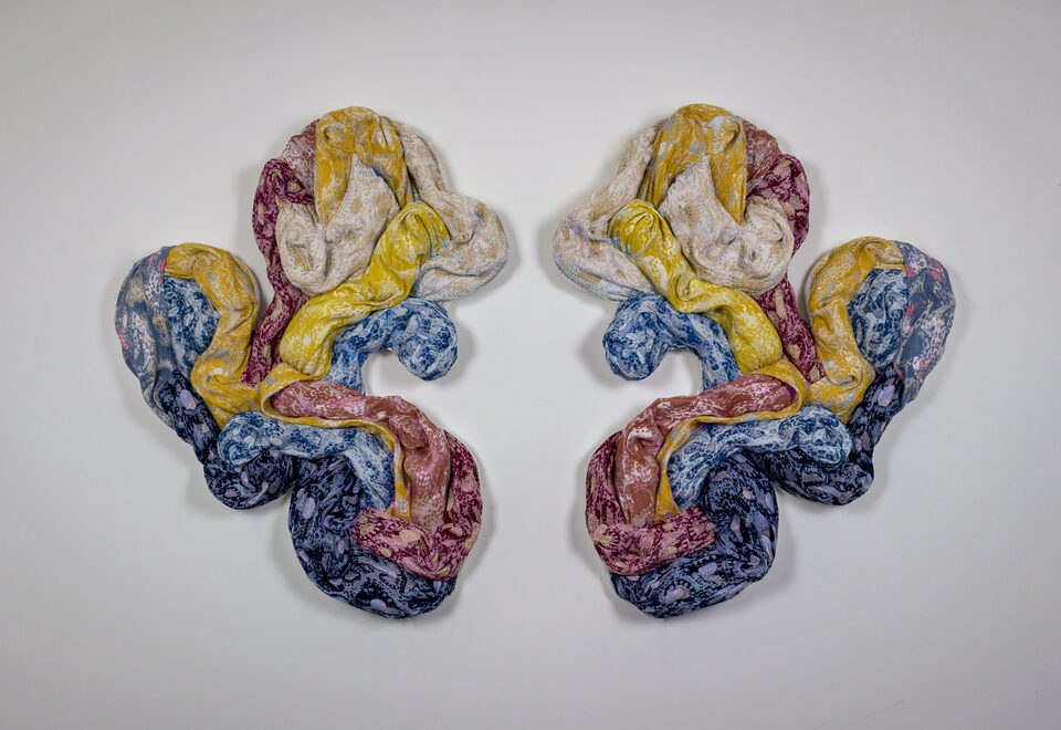The artwork Andetag no. 35, textile sculpture in spotlight.