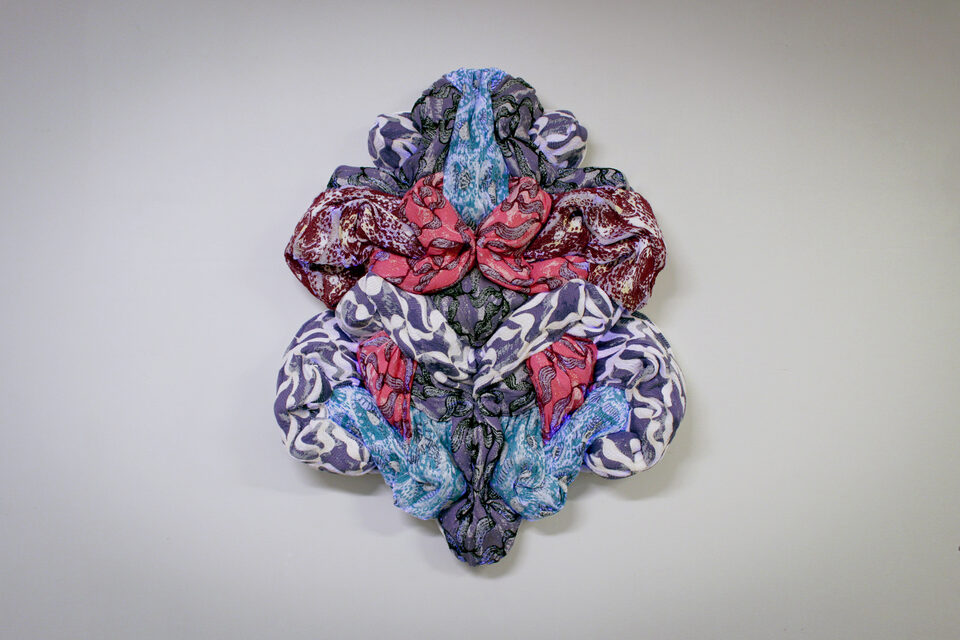 The artwork Andetag no. 4, textile sculpture in spotlight.
