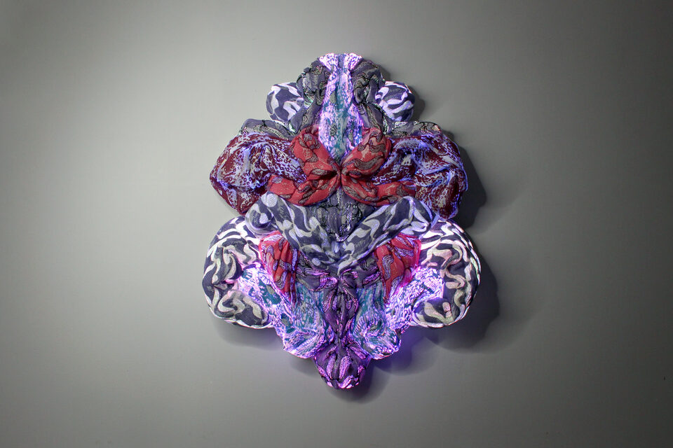 The artwork Andetag no. 4, textile sculpture in soft ambient light.