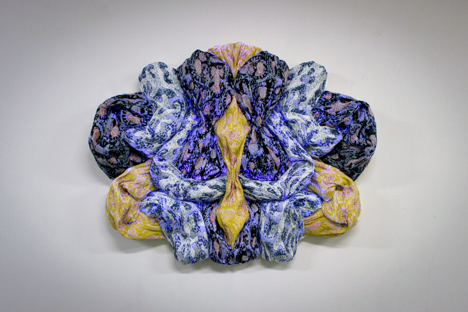 The artwork Andetag no. 5, textile sculpture in spotlight.
