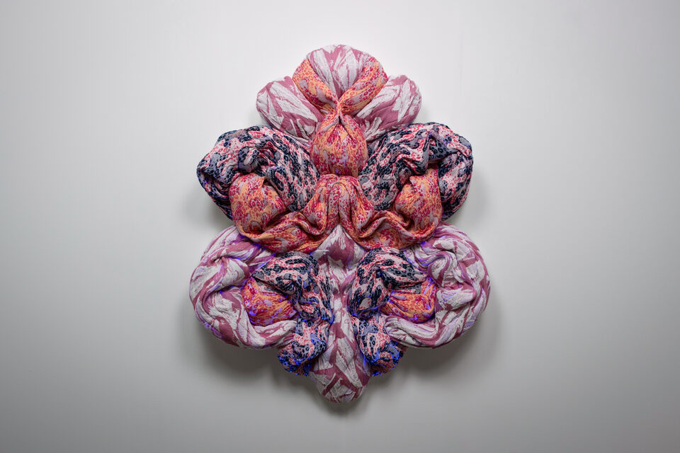 The artwork Andetag no. 9, textile sculpture in spotlight.