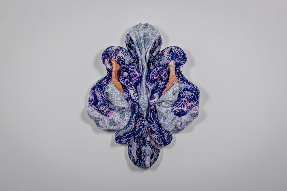 Sapphire in spotlight, luminous in deep blue and indigo tones.